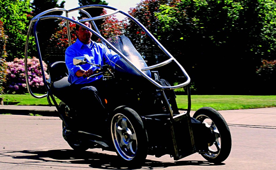 2010-Spring-Oregon-Venture-Portland-Green-Lite-Motors-owner-Tim-Miller-driving-hybrid-vehicle