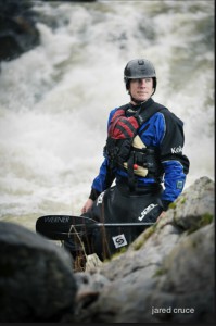 2013-march-april-1859-magazine-southern-oregon-athlete-profile-rogue-river-kayaker-chris-korbulic-standing-with-boat-paddle