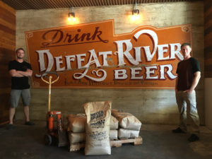 defeat river beer