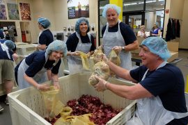 Portland-based Consumer Cellular employees volunteer at the Oregon Food Bank