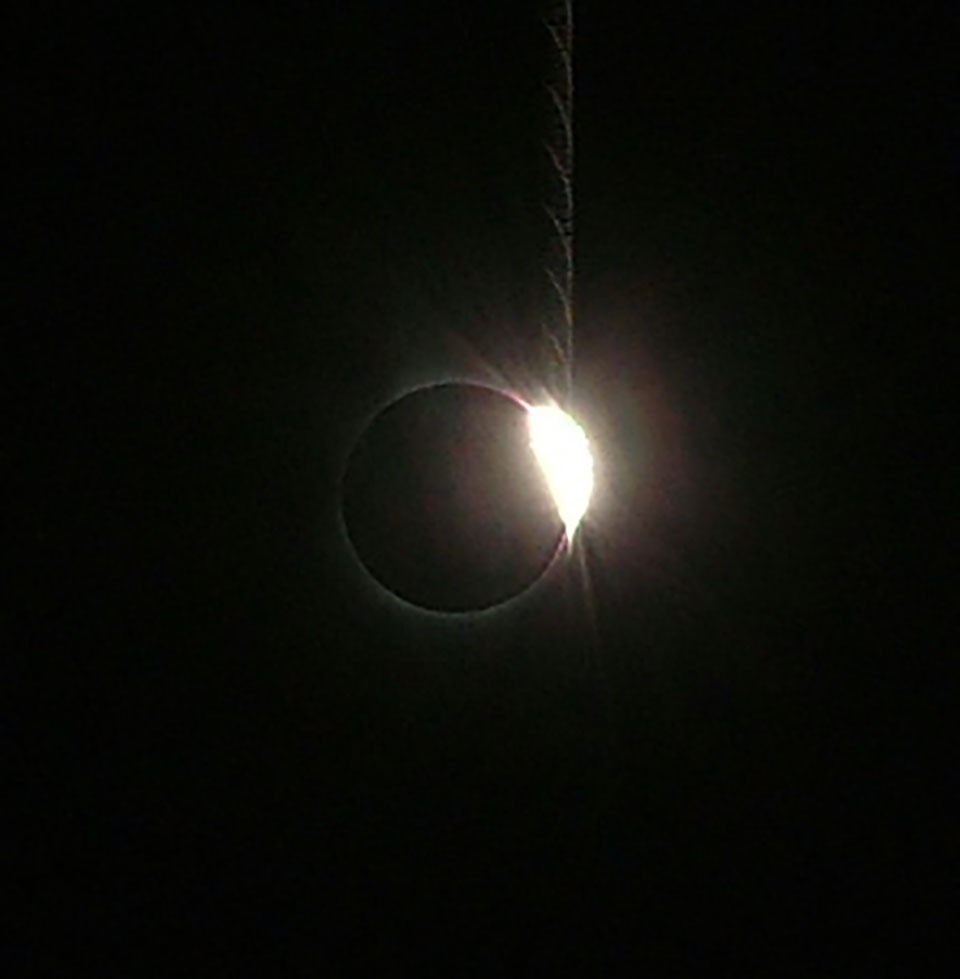 The end of totality. However, before more than a sliver of the sun had a chance to pop into view, I snapped a picture of what is called the Diamond Ring.