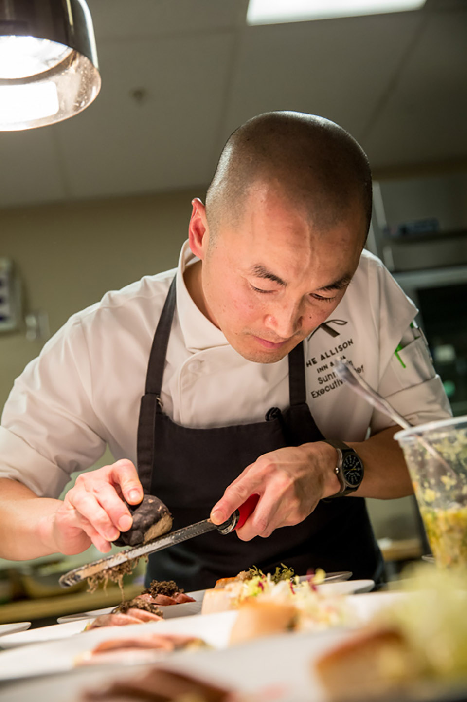 Chef Sunny Jin of The Allison Inn & Spa prepares for the Black & White Dinner Series in 2016.