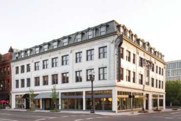 Hotel Grand Stark’s exterior reveals the building’s heritage from 1906, as the Hotel Chamberlin.