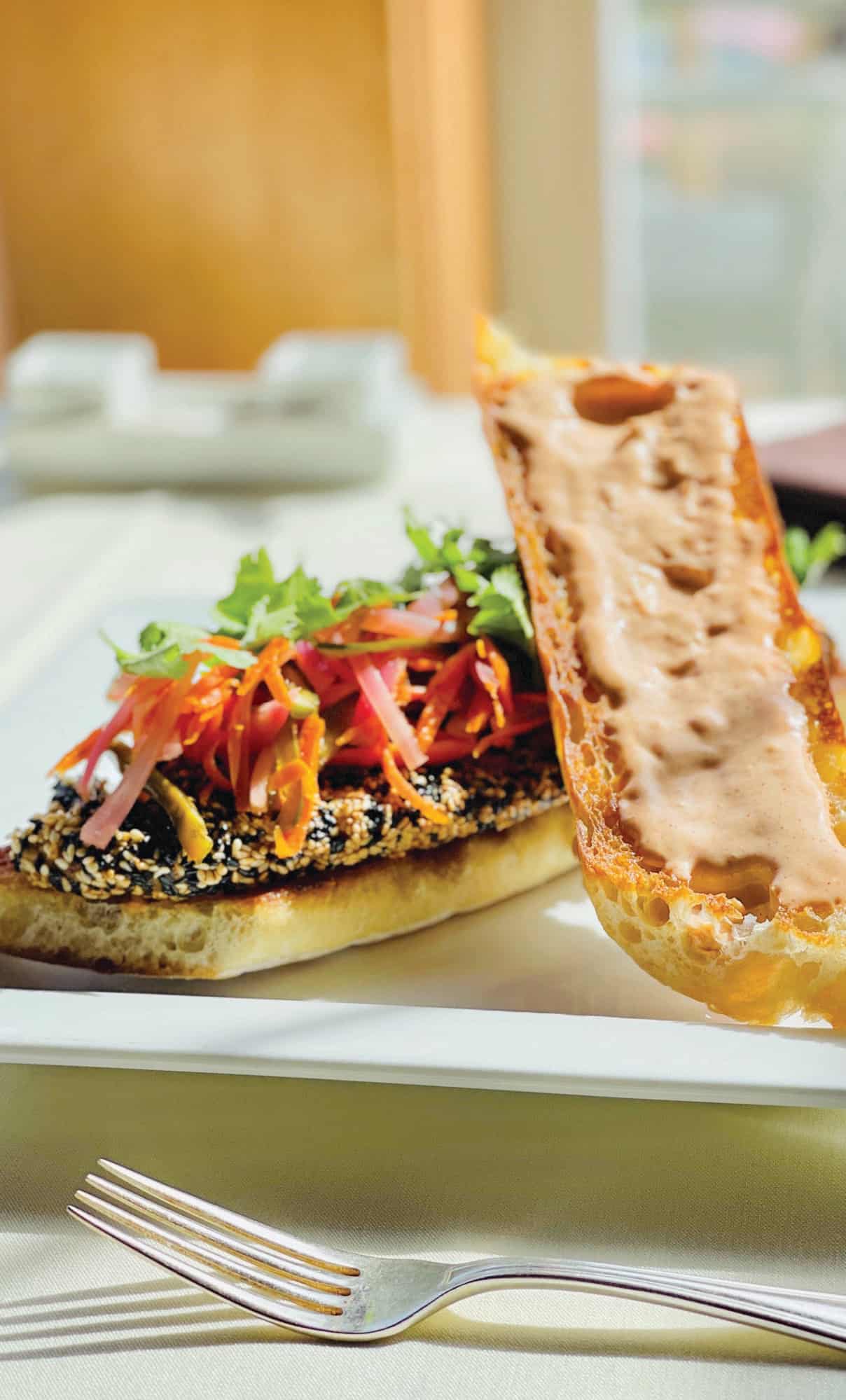 The perfect pairing of French baguette and Oregon rockfish is revealed in Stephanie Inn’s sesame-crusted rockfish banh mi.