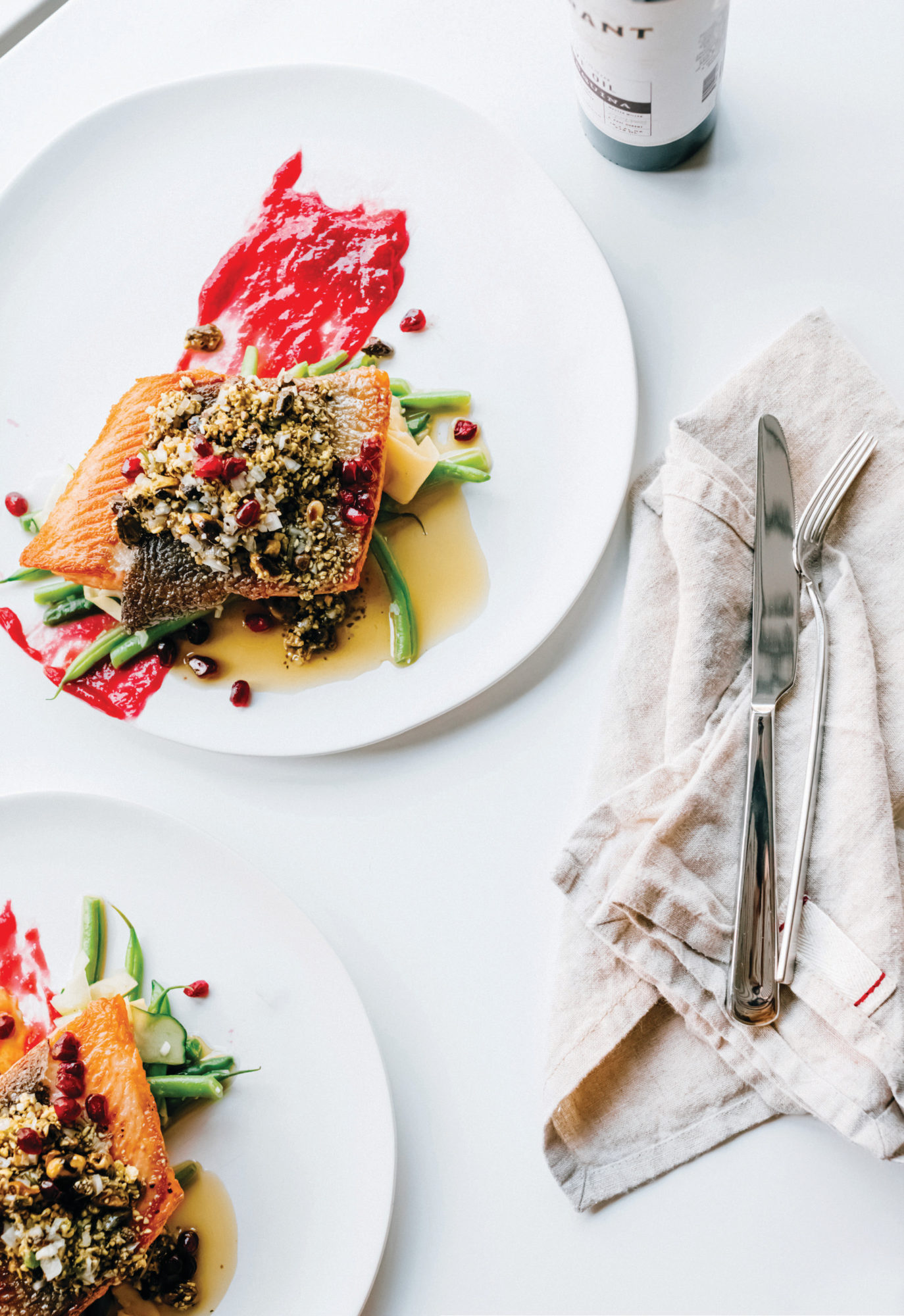 NORR Kitchen’s ocean trout with pole beans, zucchini, pistachio vinaigrette and sweet and sour pomegranate.