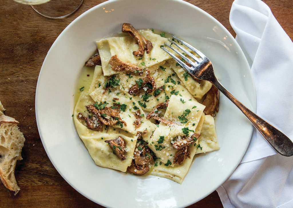 Nostrana’s goat cheese-stuffed pappardelle with sage butter and wild mushrooms.