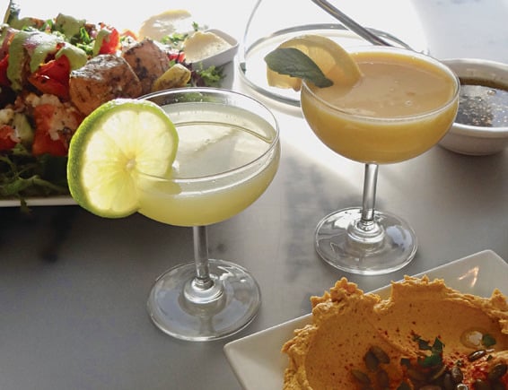 Pair a cocktail with the za’atar salmon kabob salad or seasonal hummus at Nicholas Restaurant.