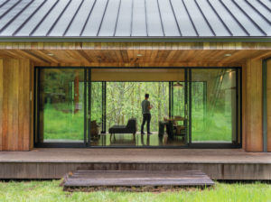 On a forest clearing outside of Tillamook, a couple creates its own Oil Can Henry’s architectural style.