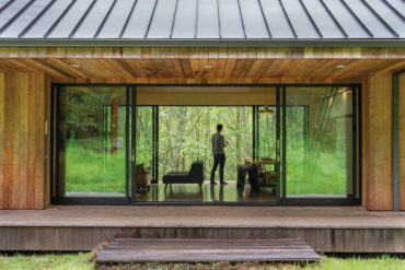 On a forest clearing outside of Tillamook, a couple creates its own Oil Can Henry’s architectural style.