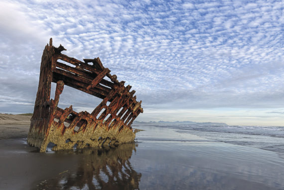 The hull of the Peter Iredale, a British ship that ran aground in 1906 in what is now Fort Stevens State Park.