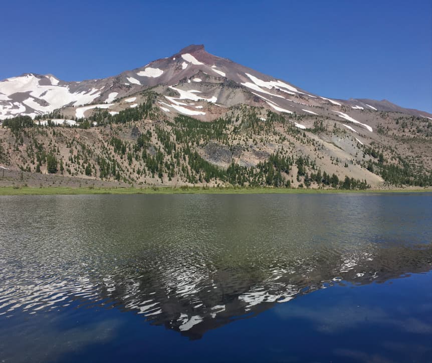 From the top of Green Lakes Trail, the Cascade Range opens up with views of South Sister.
