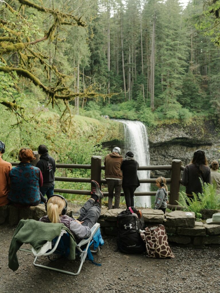 Concertgoers soak in the scenery at Silver Falls State Park in 2022.