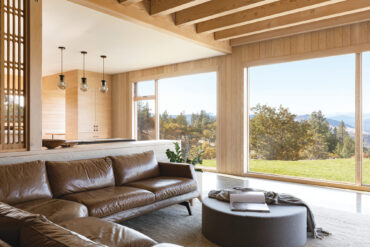 Natural fibers and warm colors follow the aesthetic of the Columbia Gorge below this Mosier home.