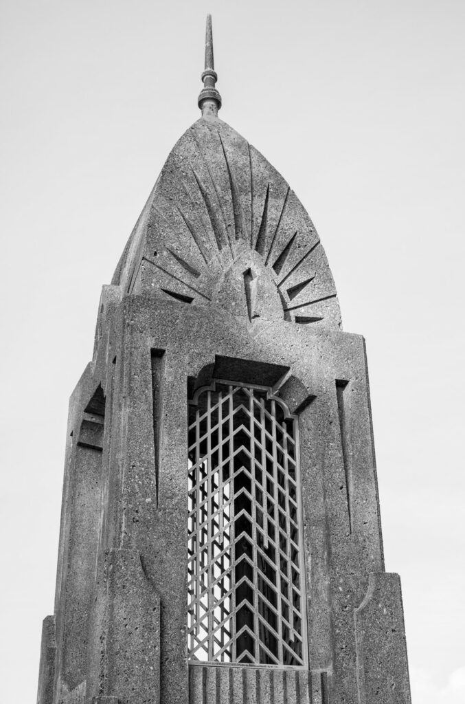 The concrete pylons of the Siuslaw River Bridge display a classic Art Deco sunburst pattern.