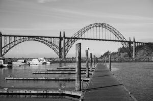 With over 130 feet of clearance, the Yaquina Bay Bridge provides fishing boats, ocean research vessels and Coast Guard boats direct access to the sea.