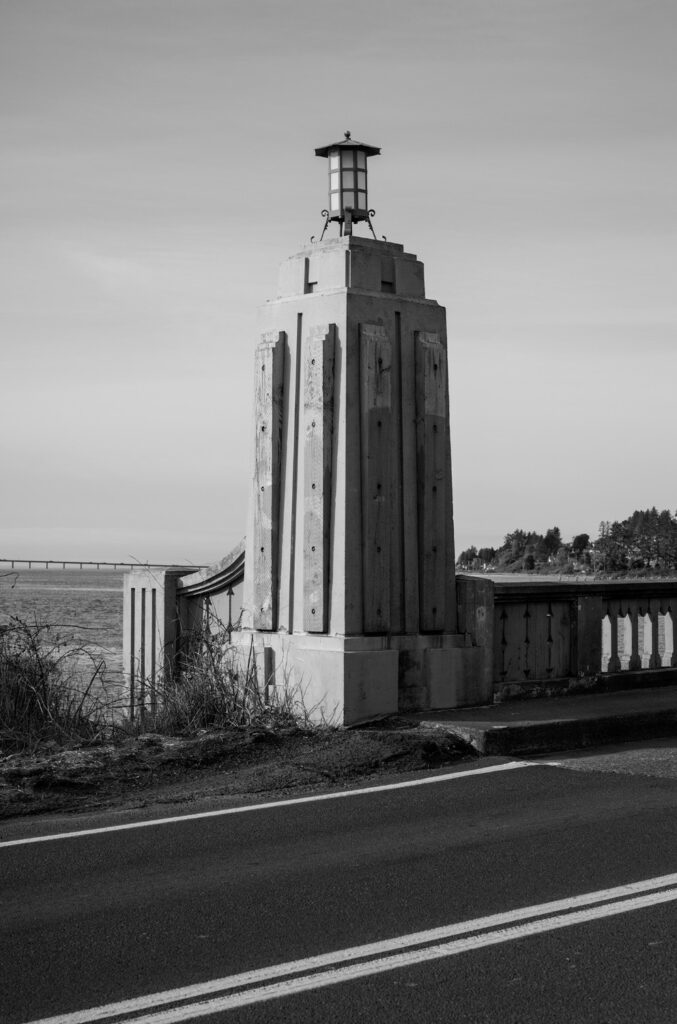 Lanterns atop pylons of concrete and wood all harken back to 1921, when the Old Youngs Bay Bridge was built.