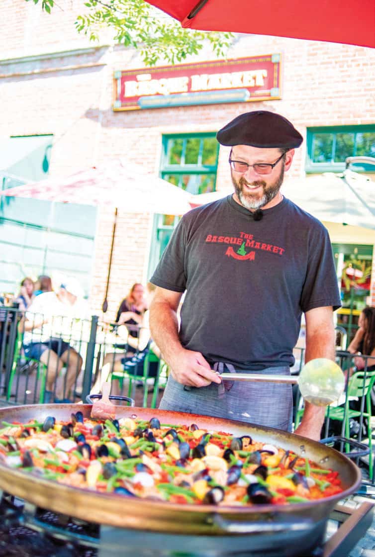 Serving up paella at The Basque Market in Boise.