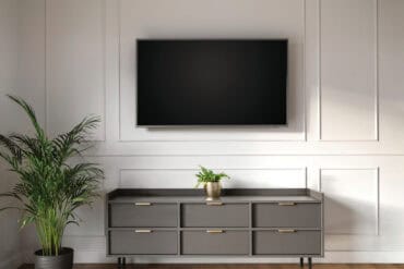 With a picture frame molding accent wall, scale and pattern are important.